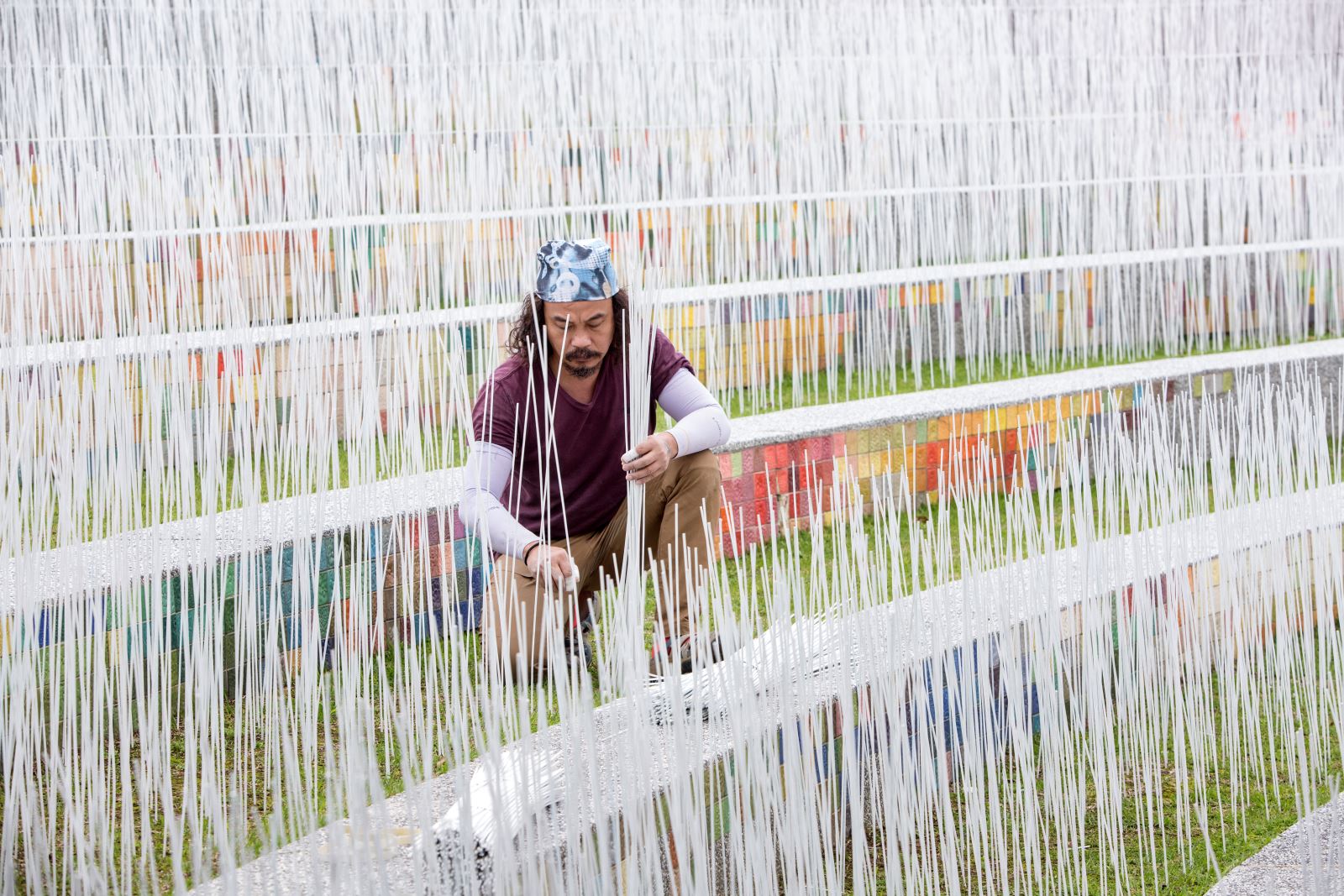 a person marking the snow in summer of land art