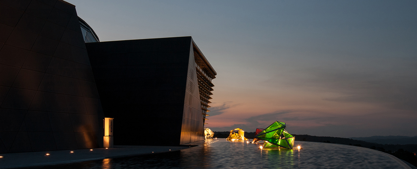 Half moon pond and installation art in evening