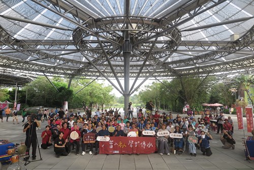 The Event Guests And Participants Took A Group Photo