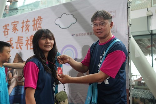 Teachers And Parents Present Safety Charms To The Students